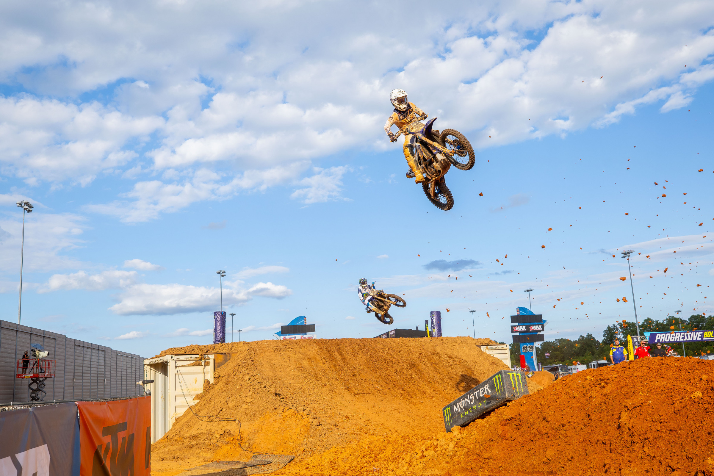 If this is what running moonshine in your motocross bike looks like, sign us up! (Also: Is Coop gonna be revving the &h*^t out of his bike behind Phil after this jump? You bet.)